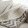 a white couch with a blanket