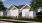 a person standing in front of a house